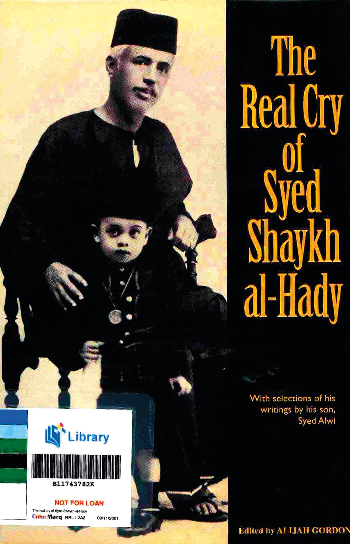 Syed Sheikh Ahmad al-Hadi bersama anaknya Syed Alwi al-Hadi semasa kecil. All rights reserved, Malaysian Sociological Research Insititute, 1999.